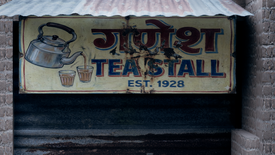 Ganesh Tea Stall Est. 1928 hand-painted sign with teapot